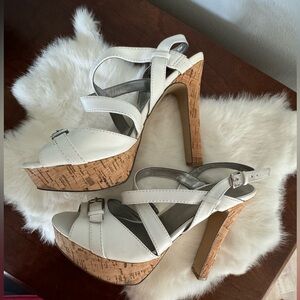 Guess open toe, white sandal with 5 1/2 in cork-like heel. Great condition. 9.